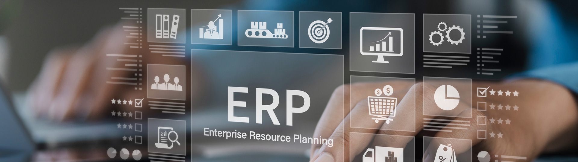 Hands on keyboard with ERP symbols on a screen overlaid over the image