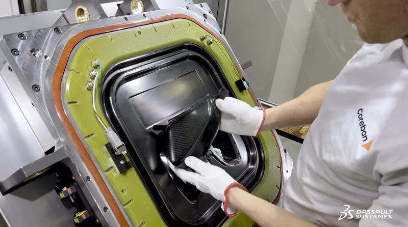 Final part being removed from metal mold that allows a very fast, uniform, and efficient heating 