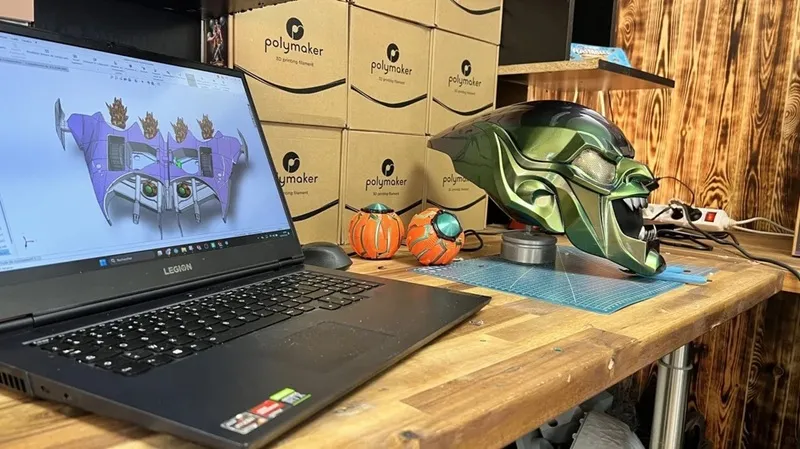 Goblin mask and glider designed in SOLIDWORKS, 3D Printed, and built by hand.