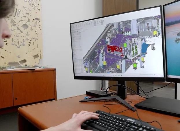 Prototype Engineer Luke designs new pinball board components