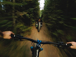 Person riding Bowhead adaptive ebike down trail - SOLIDWORKS Cloud Services