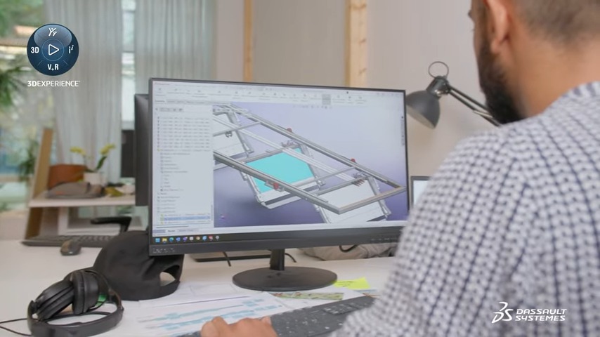 View over the shoulder of designer using 3DEXPERIENCE to design part of Elonroad.
