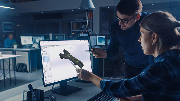 People collaborating on 3D model design - SOLIDWORKS