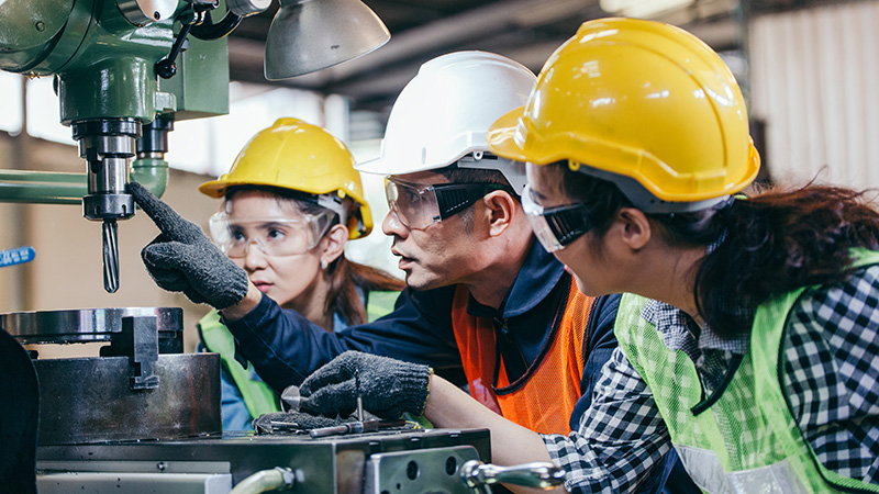 People collaborating on the assembly line