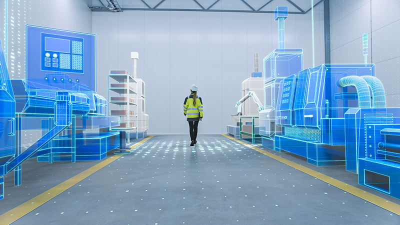 Worker walking in virtual model of manufacturing floor