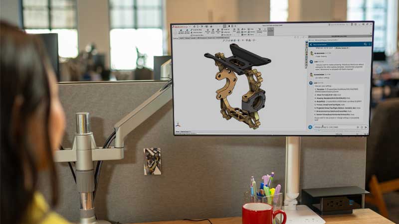Designer working on a SOLIDWORKS 3D model on computer monitor