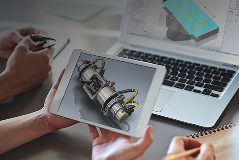 Smart manufacturing image. People viewing machinery on ipad