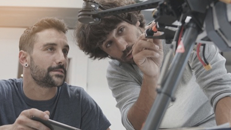 Two designers collaborating on construction of a drone - SOLIDWORKS