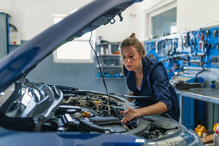 Woman working on car engine - 3DEXPERIENCE SOLIDWORKS for Makers