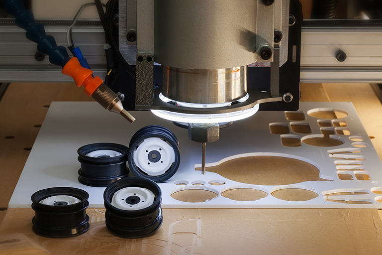CNC machine with cutout parts - 3DEXPERIENCE SOLIDWORKS for Makers