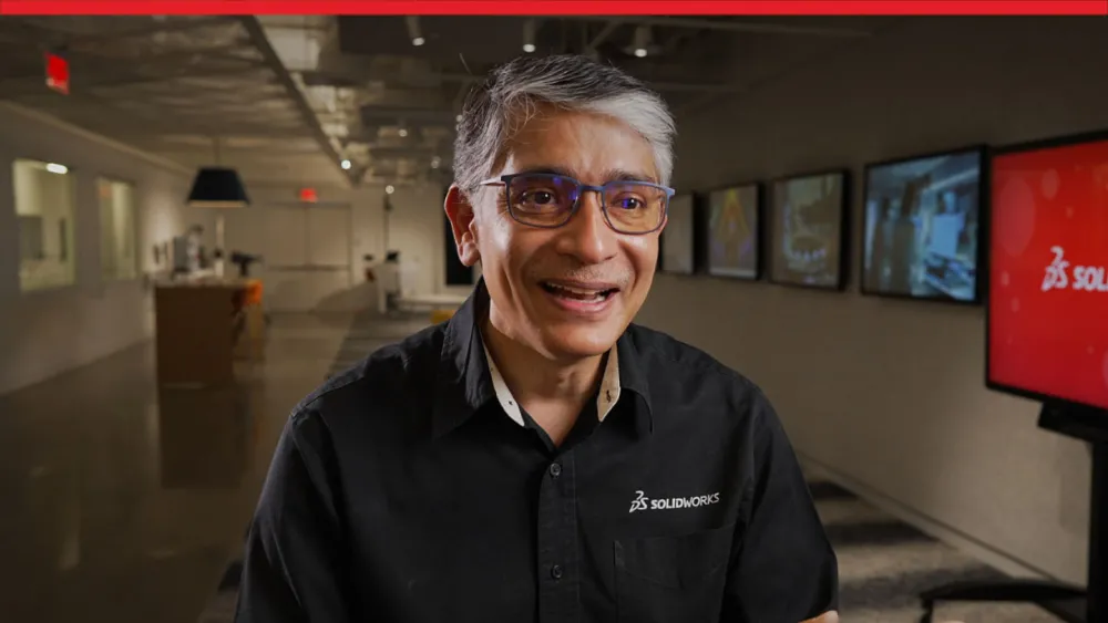 SOLIDWORKS CEO Manish Kumar in screen speaking about SOLIDWORKS AI