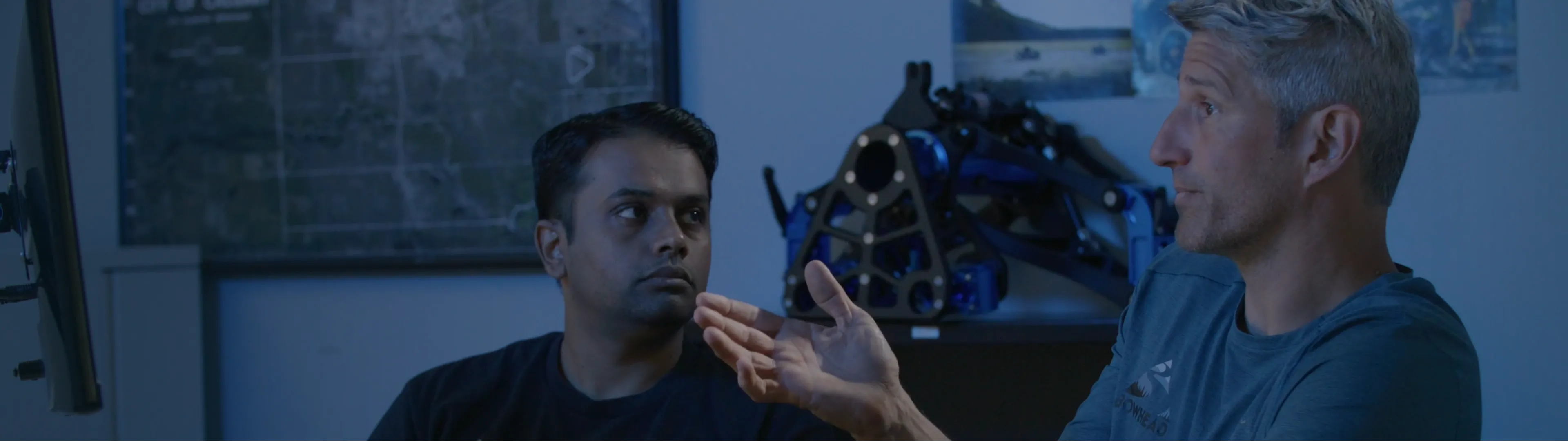 2 men discussing design ideas