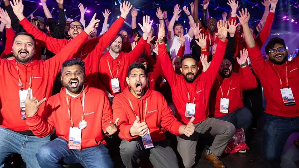 3DEXPERIENCE World 2025 attendees cheering and celebrating the moment