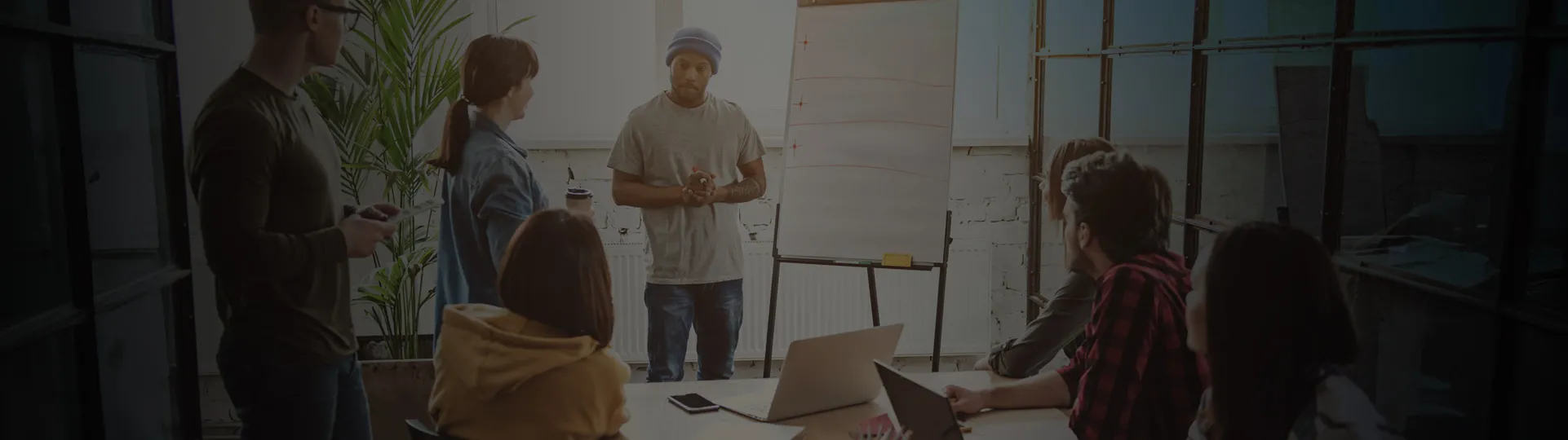 Small team of employees discussing a project