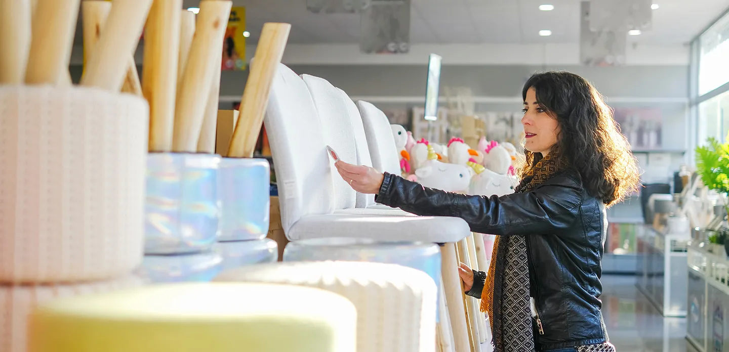 woman browsing furniture in store